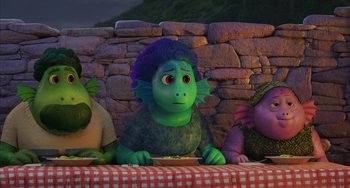 Movie still from “Luca” (2021), directed by Enrico Casarosa – A group of people that are sitting at a table; Medium shot, High angle