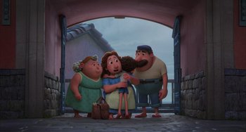 Movie still from “Luca” (2021), directed by Enrico Casarosa – A group of people standing next to each other in front of an archway; Wide shot, Low angle