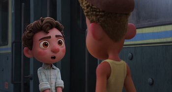 Movie still from “Luca” (2021), directed by Enrico Casarosa – Two animated characters one of which is looking at the other; Medium shot, Over the shoulder angle