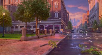 Movie still from “Luck” (2022), directed by Peggy Holmes – A city street with a tree in the middle of the street; Extreme Wide shot, Low angle