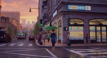Movie still from “Luck” (2022), directed by Peggy Holmes – A woman with an umbrella crosses the street at a crosswalk; Wide shot, Over the shoulder angle