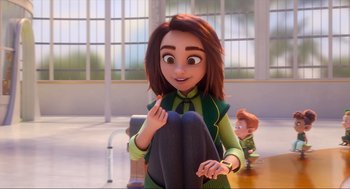 Movie still from “Luck” (2022), directed by Peggy Holmes – A woman is holding a stuffed animal in her hands; Medium shot, Over the shoulder angle