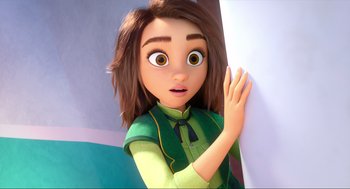 Movie still from “Luck” (2022), directed by Peggy Holmes – A cartoon girl with brown hair and a green shirt; Close Up shot, Over the shoulder angle