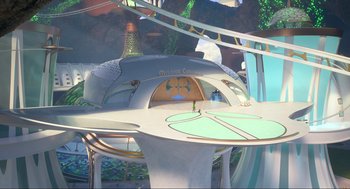 Movie still from “Luck” (2022), directed by Peggy Holmes – An image of a futuristic building with a bottle on top of it; Extreme Wide shot, High angle