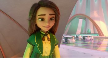 Movie still from “Luck” (2022), directed by Peggy Holmes – A cartoon girl with long brown hair wearing a green jacket; Medium shot, Over the shoulder angle