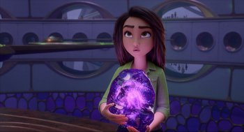 Movie still from “Luck” (2022), directed by Peggy Holmes – A woman holding a purple object in her hands; Medium shot, Over the shoulder angle