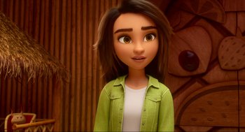 Movie still from “Luck” (2022), directed by Peggy Holmes – A girl with brown hair wearing a green shirt; Close Up shot, Over the shoulder angle