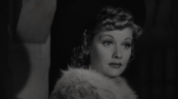Movie still from “Lucy and Desi” (2022), directed by Amy Poehler – A black - and - white photo of a woman in a fur coat; Close Up shot, High angle