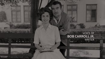 Movie still from “Lucy and Desi” (2022), directed by Amy Poehler – An old photo of a man and a woman sitting on a park bench; Medium shot, Low angle