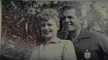 Movie still from “Lucy and Desi” (2022), directed by Amy Poehler – An old black and white photo of a man and a woman; Close Up shot, Overhead angle