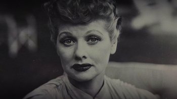 Movie still from “Lucy and Desi” (2022), directed by Amy Poehler – An old black and white photo of a woman; Extreme Close Up shot, High angle