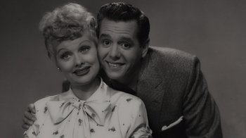 Movie still from “Lucy and Desi” (2022), directed by Amy Poehler – An old black and white photo of a man and a woman; Close Up shot, Low angle