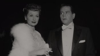 Movie still from “Lucy and Desi” (2022), directed by Amy Poehler – An old black and white photo of a man and a woman; Close Up shot, Low angle