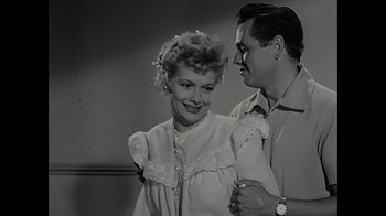 Movie still from “Lucy and Desi” (2022), directed by Amy Poehler – A man and a woman standing next to each other; Close Up shot, Low angle