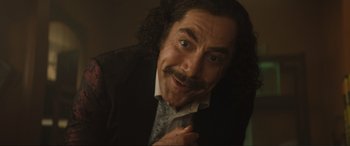 Movie still from “Lyle, Lyle, Crocodile” (2022), directed by Will Speck – A person wearing a suit and tie; Close Up shot, Low angle