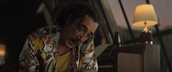 Movie still from “Lyle, Lyle, Crocodile” (2022), directed by Will Speck – A man sitting in front of a piano looking sad; Close Up shot, Low angle