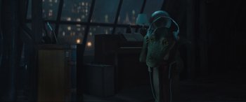 Movie still from “Lyle, Lyle, Crocodile” (2022), directed by Will Speck – A person wearing headphones and listening to music in a room; Medium shot, High angle