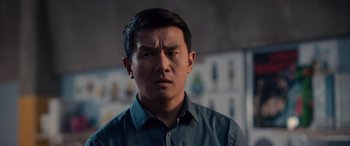 Movie still from “M3GAN” (2022), directed by Gerard Johnstone – A person wearing a blue shirt; Close Up shot, Over the shoulder angle