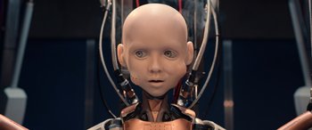 Movie still from “M3GAN” (2022), directed by Gerard Johnstone – An artificial head with wires attached to it's head; Close Up shot, High angle