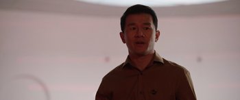 Movie still from “M3GAN” (2022), directed by Gerard Johnstone – A person wearing a brown shirt; Close Up shot, Low angle