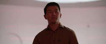 Movie still from “M3GAN” (2022), directed by Gerard Johnstone – A person wearing a brown shirt; Close Up shot, Low angle