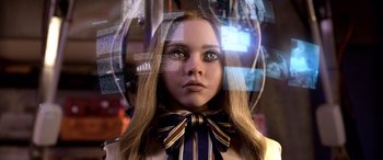 Movie still from “M3GAN” (2022), directed by Gerard Johnstone – A girl with a bow tie is looking at the camera; Close Up shot, Low angle