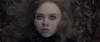 Movie still from “M3GAN” (2022), directed by Gerard Johnstone – A young woman's face with blue eyes; Extreme Close Up shot, Overhead angle