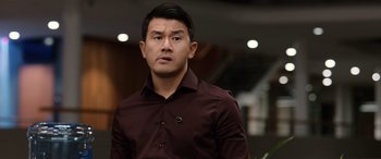 Movie still from “M3GAN” (2022), directed by Gerard Johnstone – A person wearing a maroon shirt; Close Up shot, Over the shoulder angle