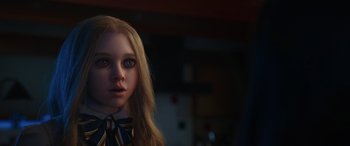 Movie still from “M3GAN” (2022), directed by Gerard Johnstone – A woman with long blonde hair wearing a school uniform; Close Up shot, Over the shoulder angle