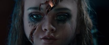 Movie still from “M3GAN” (2022), directed by Gerard Johnstone – A woman's face with green eyes; Extreme Close Up shot, High angle