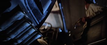 Movie still from “Mad Max” (1979), directed by George Miller – View of a car's front window; Close Up shot, Low angle