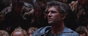 Movie still from “Mad Max Beyond Thunderdome” (1985), directed by George Miller – A person wearing a costume; Close Up shot, Low angle