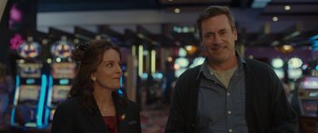 Movie still from “Maggie Moore(s)” (2023), directed by John Slattery – A man and a woman standing next to each other; Medium shot, Over the shoulder angle