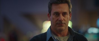 Movie still from “Maggie Moore(s)” (2023), directed by John Slattery – A person wearing a shirt; Close Up shot, Over the shoulder angle