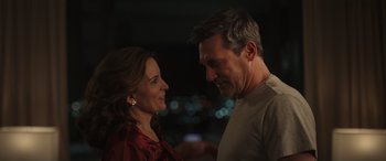 Movie still from “Maggie Moore(s)” (2023), directed by John Slattery – A man and a woman looking at one another; Close Up shot, Over the shoulder angle