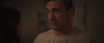Movie still from “Maggie Moore(s)” (2023), directed by John Slattery – A person looking at the camera; Close Up shot, Low angle