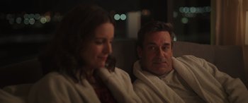 Movie still from “Maggie Moore(s)” (2023), directed by John Slattery – A man and a woman sitting next to each other; Medium shot, Over the shoulder angle