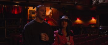Movie still from “Magic Mike's Last Dance” (2023), directed by Steven Soderbergh – A man and a woman standing next to each other; Medium shot, Over the shoulder angle