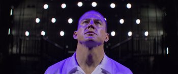Movie still from “Magic Mike's Last Dance” (2023), directed by Steven Soderbergh – A man with a bald head looking up at the ceiling; Close Up shot, Low angle
