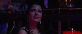 Movie still from “Magic Mike's Last Dance” (2023), directed by Steven Soderbergh – A person wearing a dress; Close Up shot, Low angle