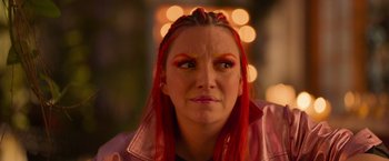 Movie still from “Making It Up” (2023), directed by Guillermo Calderón – A person with red hair; Close Up shot, Over the shoulder angle