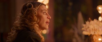 Movie still from “Making It Up” (2023), directed by Guillermo Calderón – A person looking to the side; Close Up shot, Over the shoulder angle