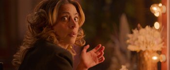 Movie still from “Making It Up” (2023), directed by Guillermo Calderón – A person talking to someone; Close Up shot, Over the shoulder angle