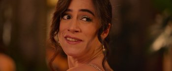 Movie still from “Making It Up” (2023), directed by Guillermo Calderón – A woman's face with her eyes wide open; Close Up shot, Over the shoulder angle