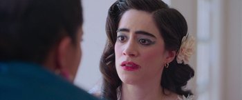 Movie still from “Making It Up” (2023), directed by Guillermo Calderón – A person looking at a mirror; Close Up shot, Over the shoulder angle