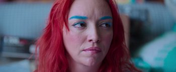 Movie still from “Making It Up” (2023), directed by Guillermo Calderón – A person with red hair and blue eyes; Close Up shot, High angle