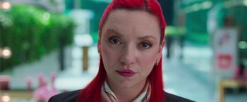 Movie still from “Making It Up” (2023), directed by Guillermo Calderón – A person with red hair; Close Up shot, High angle