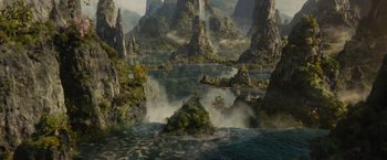 Movie still from “Maleficent” (2014), directed by Robert Stromberg – An image of an island in the middle of the ocean; Extreme Wide shot, High angle