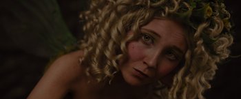 Movie still from “Maleficent” (2014), directed by Robert Stromberg – A person with curly blonde hair; Close Up shot, High angle