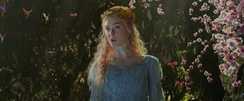 Movie still from “Maleficent: Mistress of Evil” (2019), directed by Joachim Rønning – A woman with long blonde hair wearing a blue dress; Close Up shot, Low angle